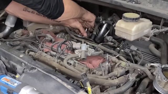 Spark Plugs And Ignition Coils On A 2015 Infinity QX60