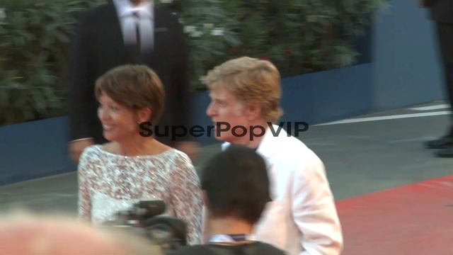 Robert Redford and Sibylle Szaggars at The Company You K...
