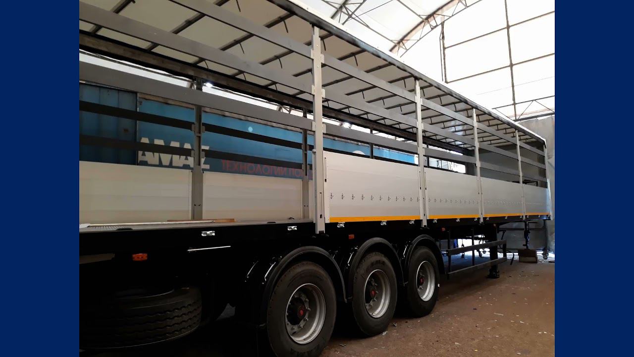 Платформу полуприцепа Нефаз оборудовали тентом каркасом, сдвижным механизмом Sesam