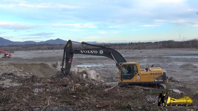 Volvo EC290B Excavator Moving Gravel