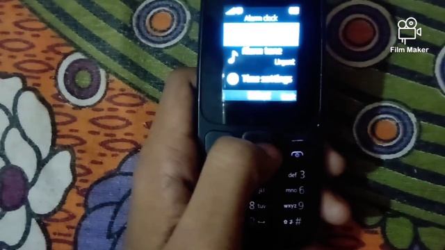 How to set alarm in Nokia 105