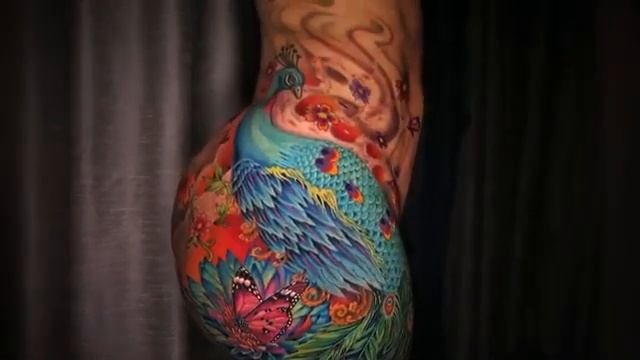 Cardi B shows of her flamingo tattoo