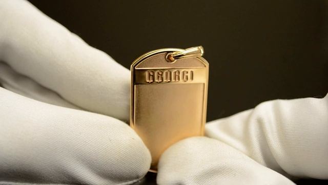 Нательный золотой жетон с изображением Георгия Победоносца и гравировкой имени святого