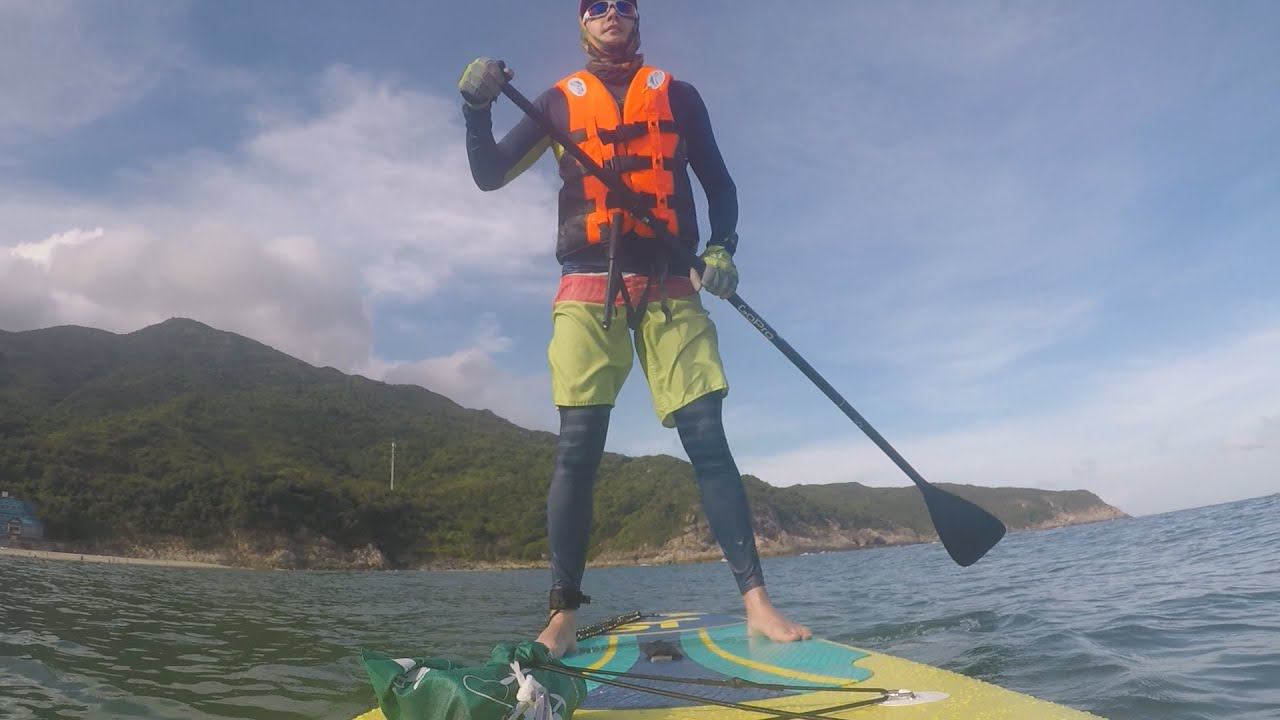 За рулем из Гуанчжоу в Шэньчжэнь, пляж Дунчонг. SUP board