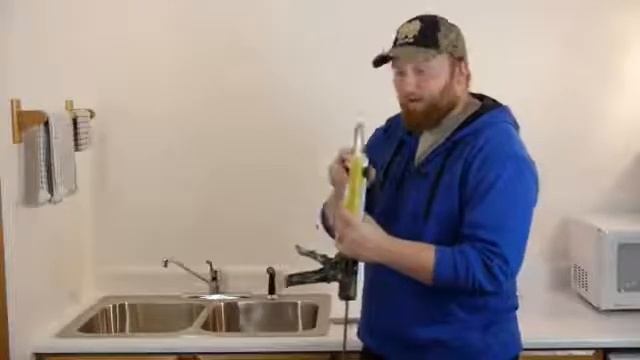 How To Caulk & Seal A Kitchen Sink On A Laminate Countertop