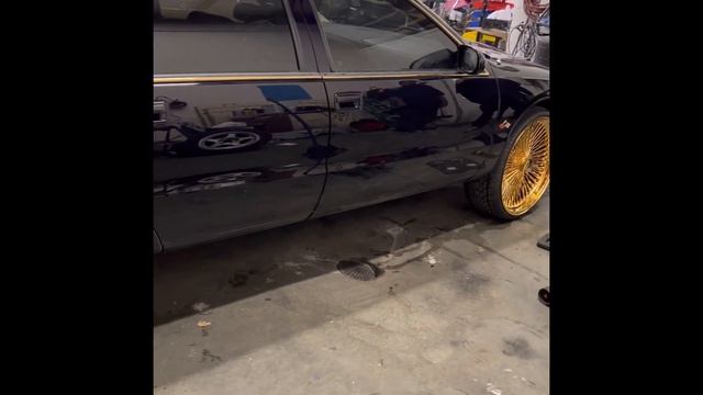 First test fitting of 24” all gold daytons on 95 impala SS.