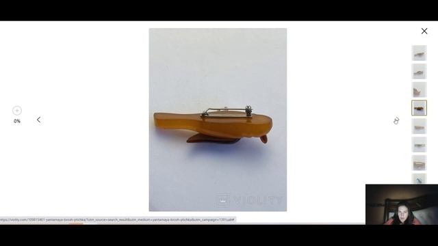 Торги на аукционе Виолити за редкую антикварную брошь из пейзажного янтаря Amber