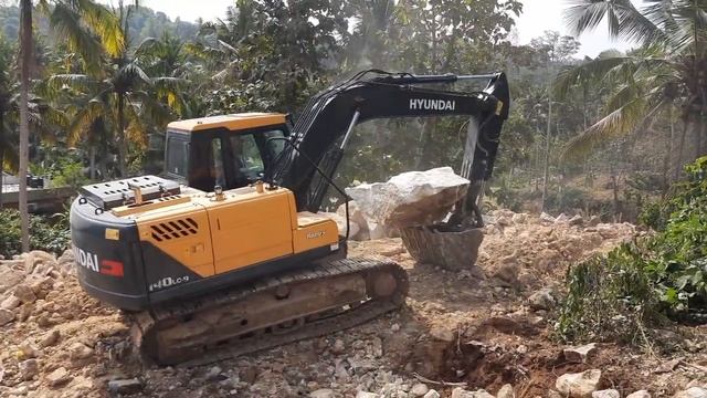 Hyundai 140 Excavator Working