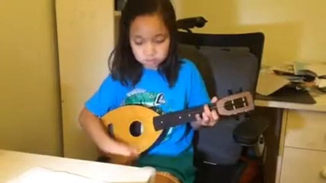 Nicole Playing Little Grass Shack