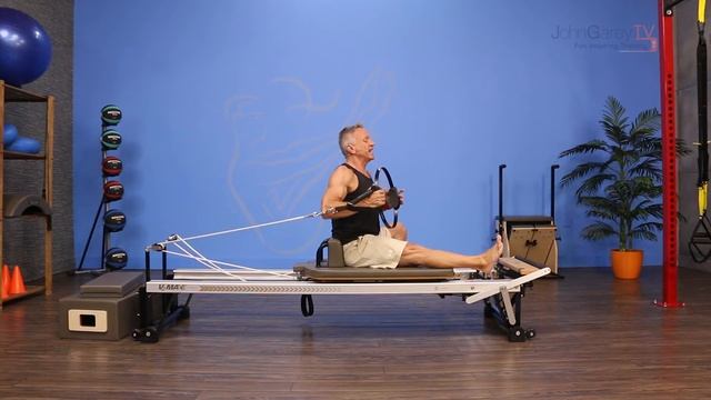Runner's Stretch With Fitness Circle On The Pilates Reformer