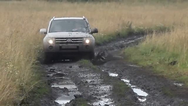 Mitsubishi Pajero 4 on a field road