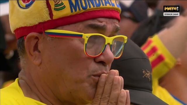 Изображение к видео: Болельщик молится в серии пенальти на матче Швейцария - Колумбия, 1/8 финала ЧМ-2026