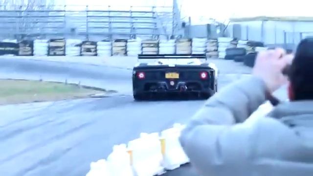 Ferrari P4 5 travels around the test track смотреть онлайн