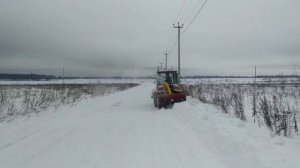 Работа МТЗ-320 со снегоотбрасывателем СТ-1500