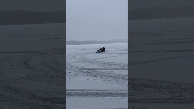 Snowmobiling In Deep Powder On The Enticer