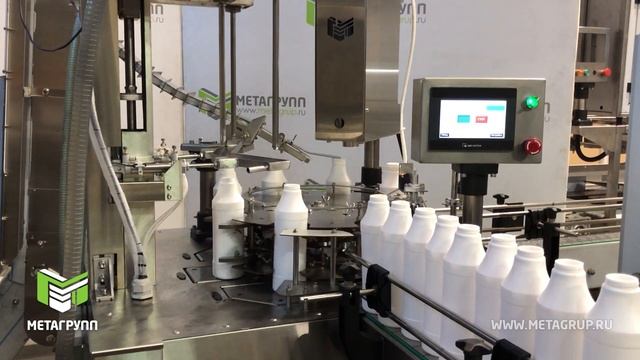 Роторный автомат розлива и укупоривания. Дозирование по весу в тару от 0,1 до 2 литров смотреть онлайн