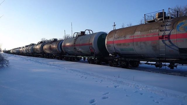 Грузовой поезд под двойной тягой 2ТЭ10У-0167,  2ТЭ10М-2502