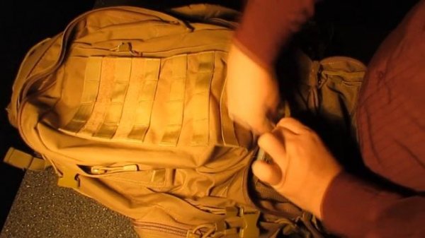 Loading up a condor Three day assault pack, fill up and go.