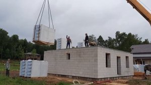 Двухэтажный дом из газобетона 9х9 м.