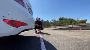 Заезд в гараж на автодроме задним ходом.