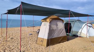 Техника установки затеняющей сетки над лагерем.