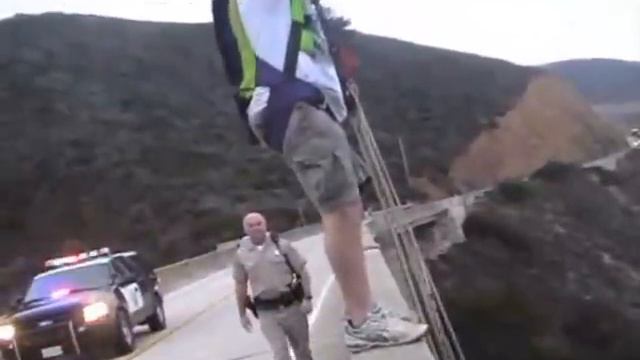 Drunk Dude Makes Illegal Bridge Base Jump