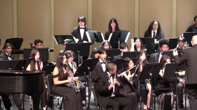 James Logan Wind Symphony performs "Un Cafecito" by Dennis Llinas смотреть онлайн