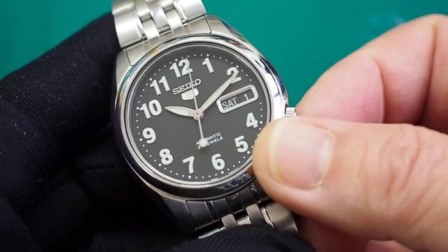 SEIKO 5 Automatic 7S26-01V0 Day/Date black dial wristwatch Runs смотреть онлайн