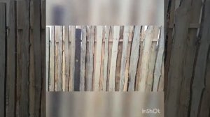 Деревянный забор и ворота из горбыля