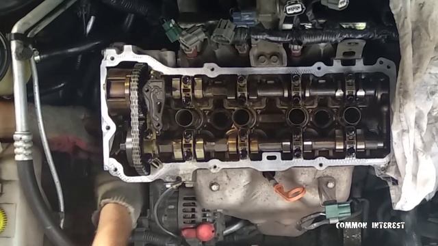 Проверяю натяжение цепи ГРМ на двигателе QG18DE Ниссан Альмера N16