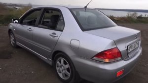 Автомобиль Митсубиси Лансер 1.6 2004 года, обзор. Mitsubishi Lancer 1.6 car of 2004, review