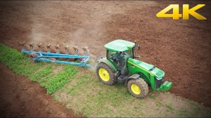 Трактор John Deere 8310R с оборотным плугом Lemken Diamant 10 вспашка поля