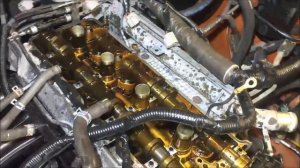 Suzuki Grand Vitara Громкая работа двигателя J20A и сизый дым, разбираемся в проблеме