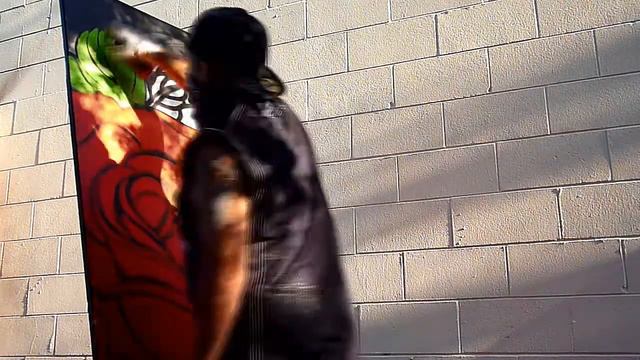 SKAN ARTS SPRAY PAINTING A ROSE