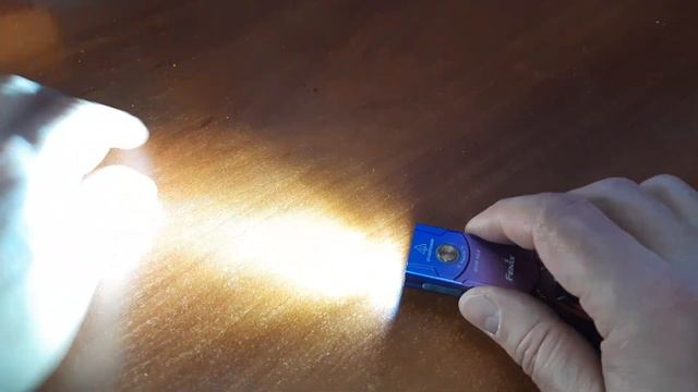 Новинка 2023:  наключный фонарь Fenix E03R T лимитированная версия