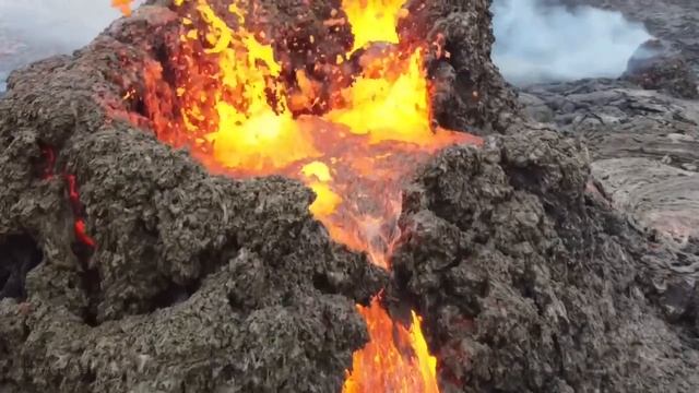 04-07-2021 Grindavik, Iceland - Drone of Volcanic Eruption Strengthening in Snowstorm смотреть онлайн