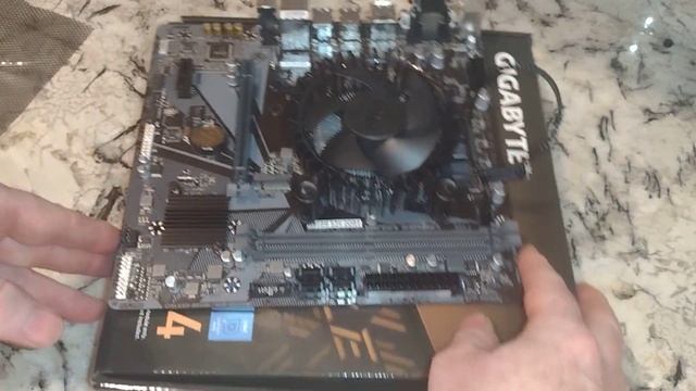 Gigabyte H610m S2H: Installing Pentium G7400, RAM and M.2 NVME смотреть онлайн