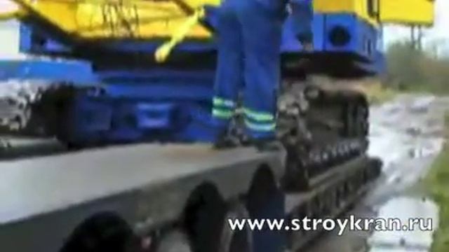 Гусеничный кран МКГ25БР погрузка на трал