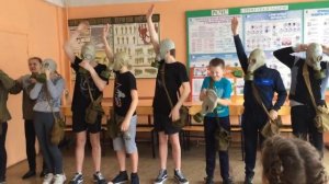 Надевание противогазов на время