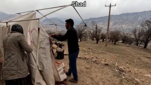 Starting to build a hut in the heart of nature and installing a tent to prevent snow and rain