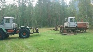 Младший брат т-150г тянет старшего т-150к на ремонт