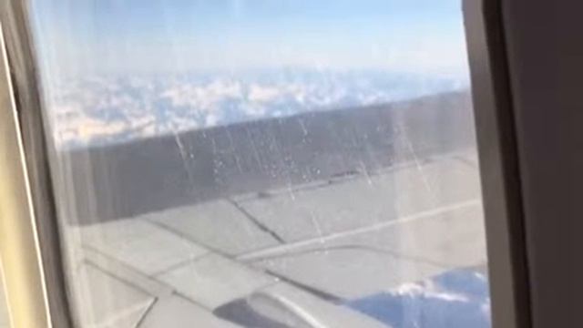 ШВЕЙЦАРСКИЕ АЛЬПЫ СВЕРХУ ВИД НА ВЕРШИНЫ ГОР ИЗ САМОЛЕТА смотреть онлайн