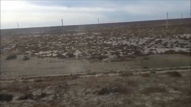 Западный Казахстан Атырауская область из окна поезда Western Kazakhstan Atyrau region train window смотреть онлайн