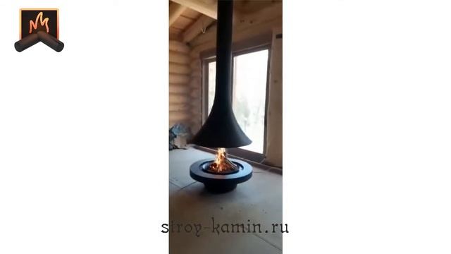 Свободностоящий современный островной камин из металла в деревянном доме: Красная поляна, город Соч
