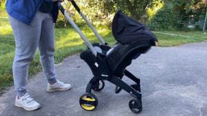 Как разложить и сложить коляску Doona