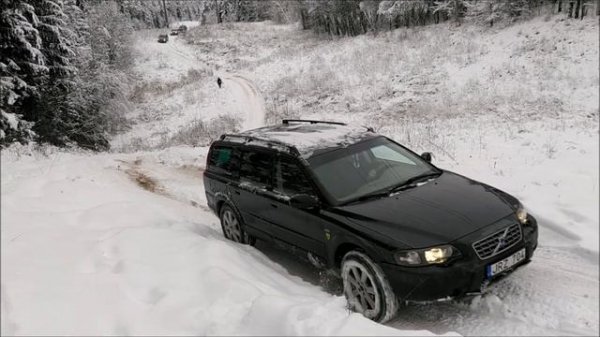 Volvo XC70 offroad. Winter AWD test. Winter drive uphill.