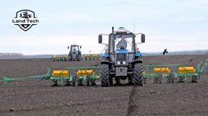 Тракторы МТЗ-1221.2 с навесными пневматическими сеялками МС-12 - посев подсолнечника
