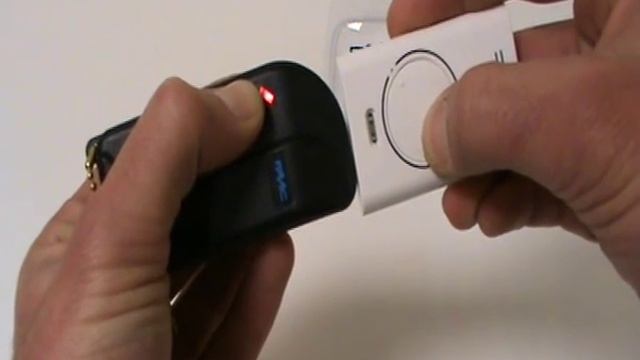 programmation de la nouvelle télécommande faac modèle XT2 868 SLH .wmv смотреть онлайн