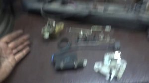 Замок и сопутствующие запчасти от крышки багажника Волги 3110,31105. Запчасти Волга.