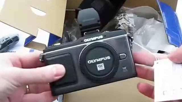 Olympus E-P2 Unboxing смотреть онлайн